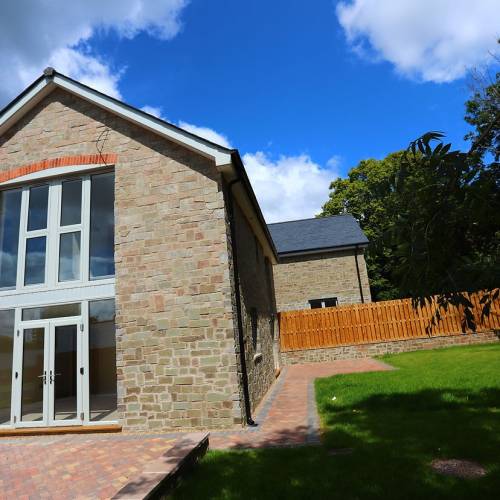 Gable end stone cladding
